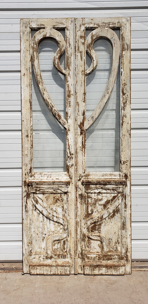 Pair of Painted Wood Multi-Lite Carved Doors