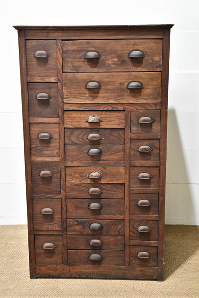 Country Store Tall Cabinet with Various Sized Drawers