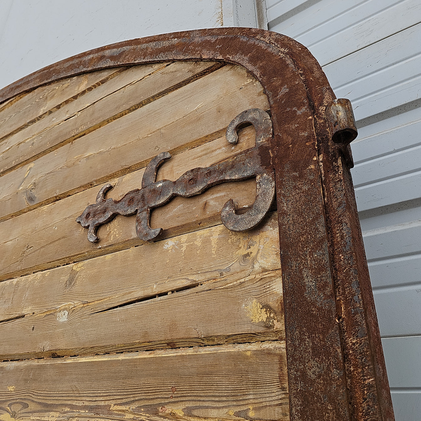 Pair of Arched Wood Doors with Iron Trim