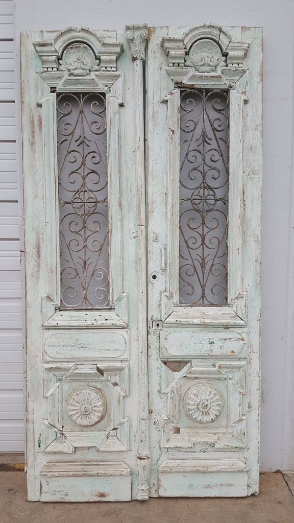 Pair of Carved Painted Wood Doors with Iron Inserts