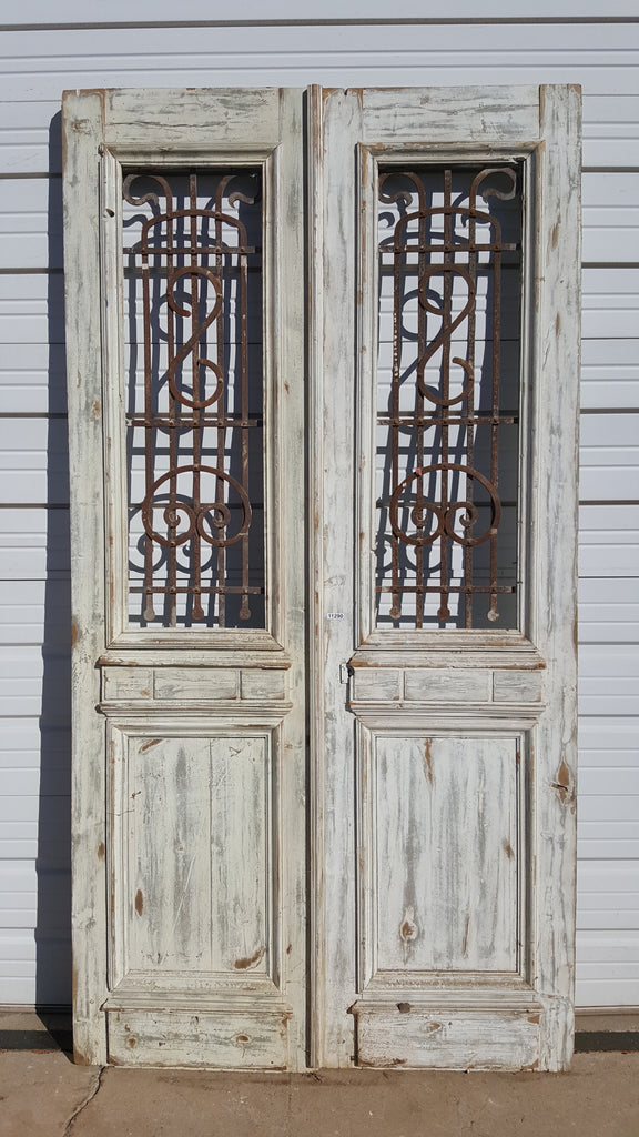 Pair of Carved Painted Wood Antique Doors with Iron Inserts