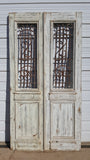 Pair of Carved Painted Wood Antique Doors with Iron Inserts