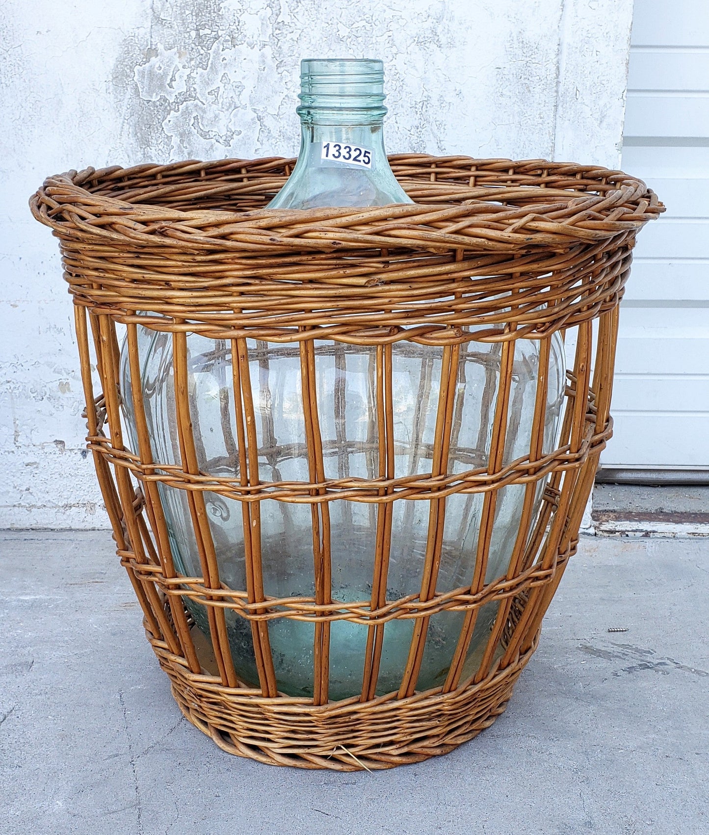 Demijohn in Wicker Basket