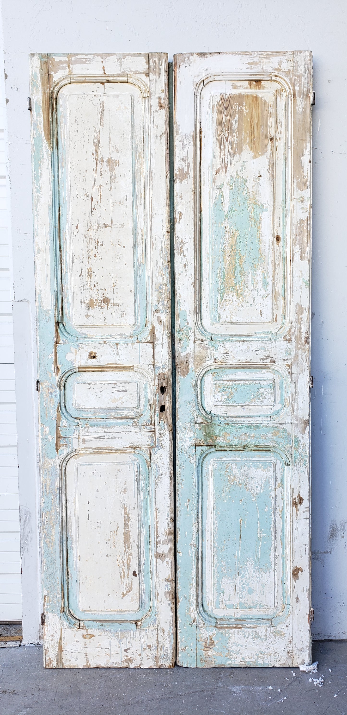 Pair of 3 Panel Distressed Wood Antique Doors