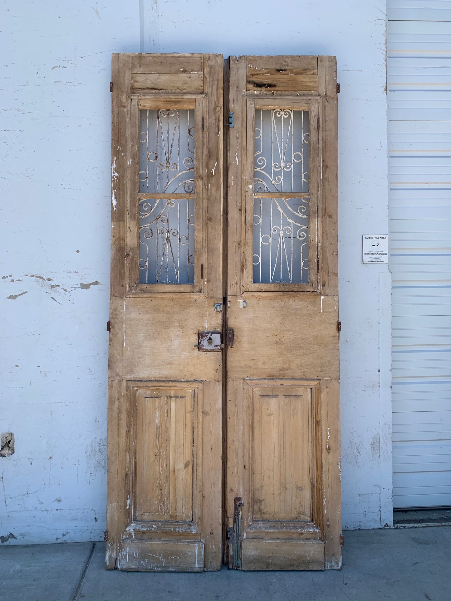 Pair of Natural Wood Antique Doors with Iron Inserts (no glass)