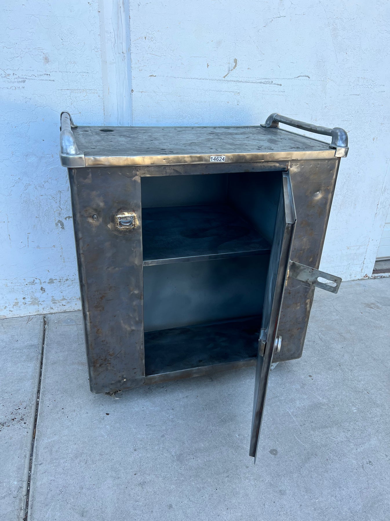 Stripped Metal Cabinet on Wheels