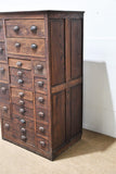 Country Store Tall Cabinet with Various Sized Drawers