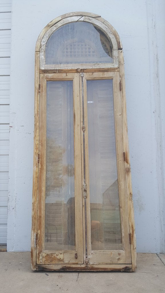 Pair of French Doors and Shutters with Ornate Spindled Transom