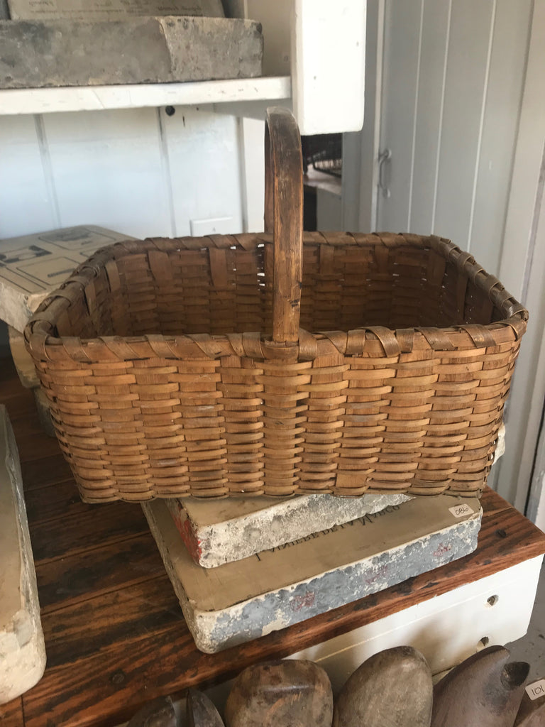 Small wicker basket with handle