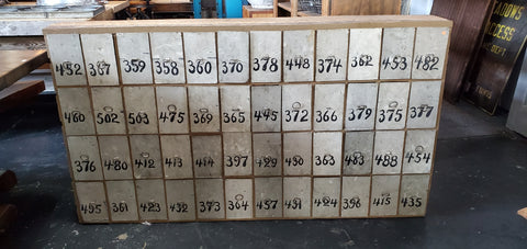 48 Numbered Metal Drawers in Wood Cabinet